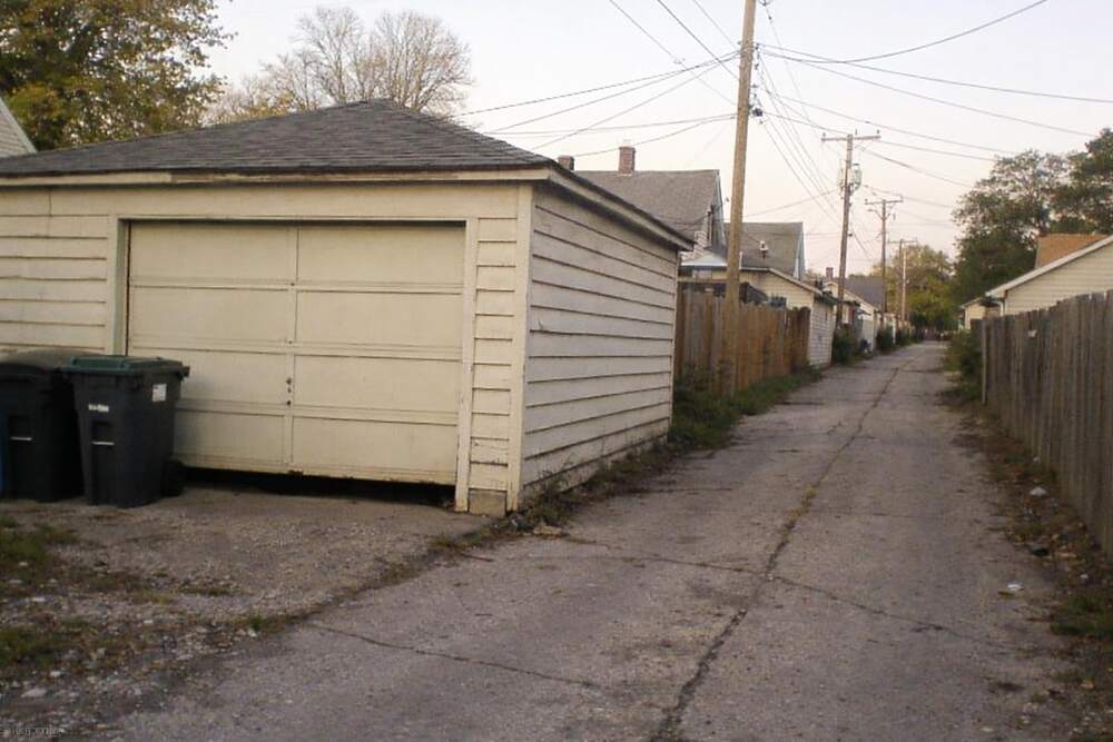 A detached garage on a residential alley
