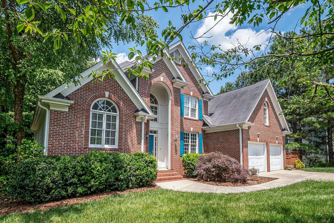 Brick houses along a suburban street