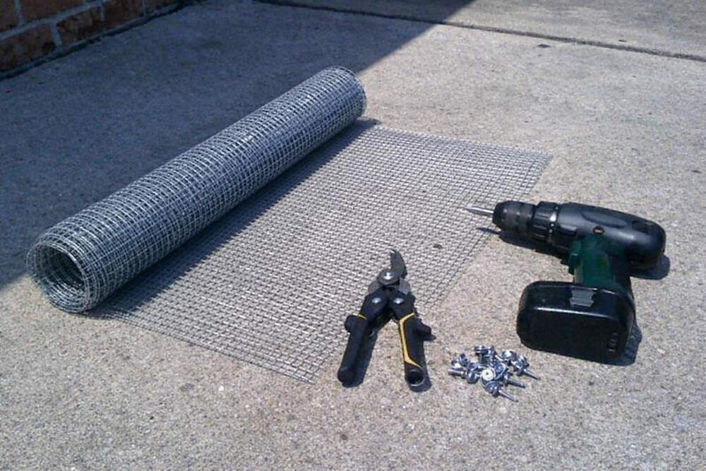 A roll of galvanized quarter-inch hardware cloth used for sealing openings