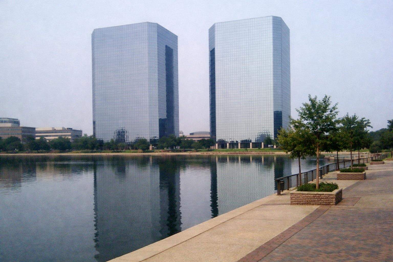 Office towers beside a lake in Las Colinas