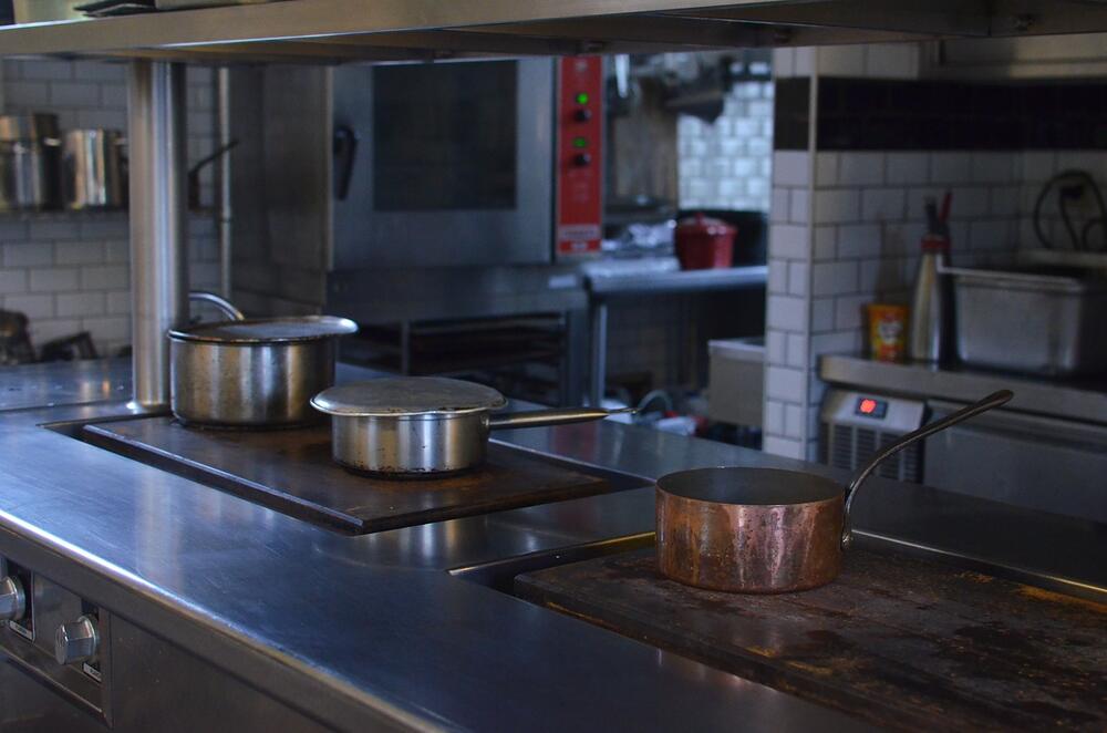 Stainless steel equipment on a restaurant kitchen line